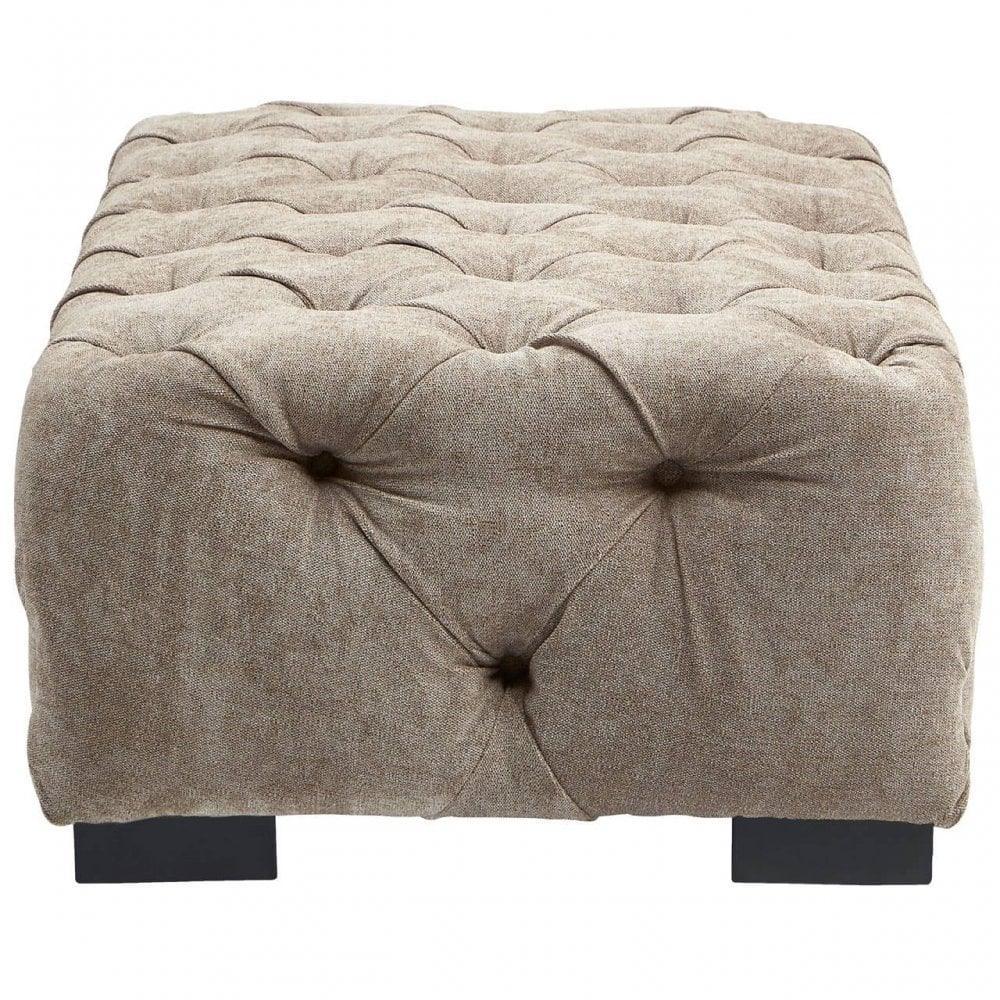 Beige fabric ottoman with deep button tufting and black wooden legs, front angle view