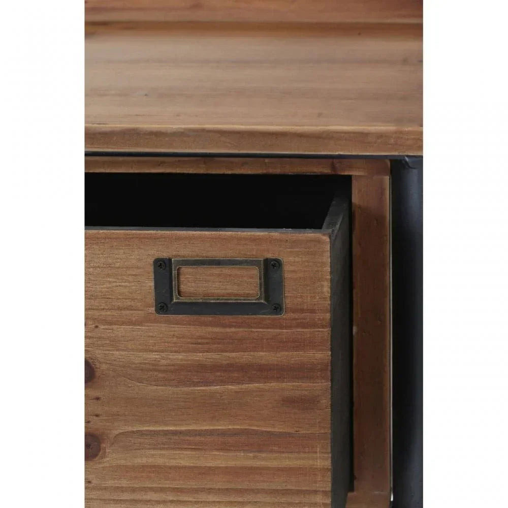 Closeup of wooden drawer with metal handle partially open on storage unit