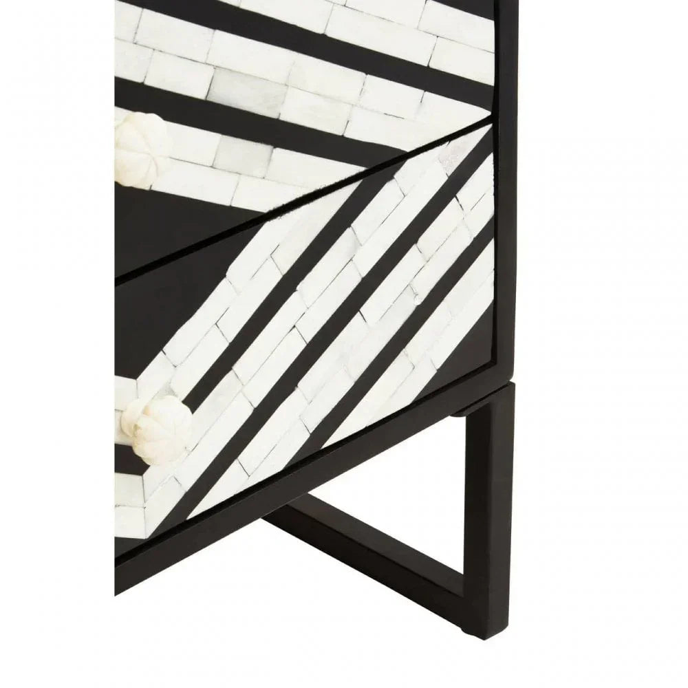 Geometric black and white bedside table with inlay design and carved round drawer handle