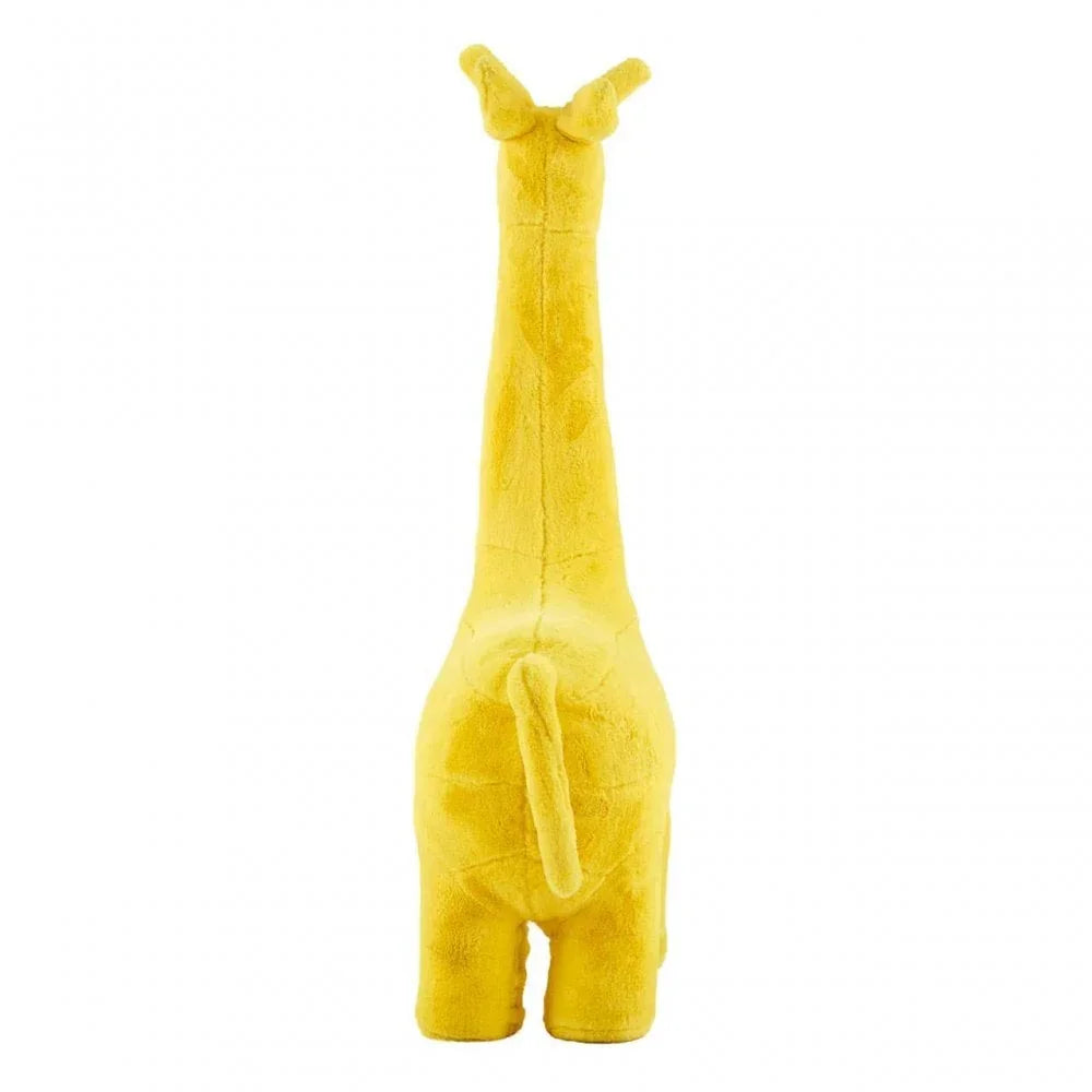 Yellow plush giraffe toy rear view, soft fabric with tail and ears visible