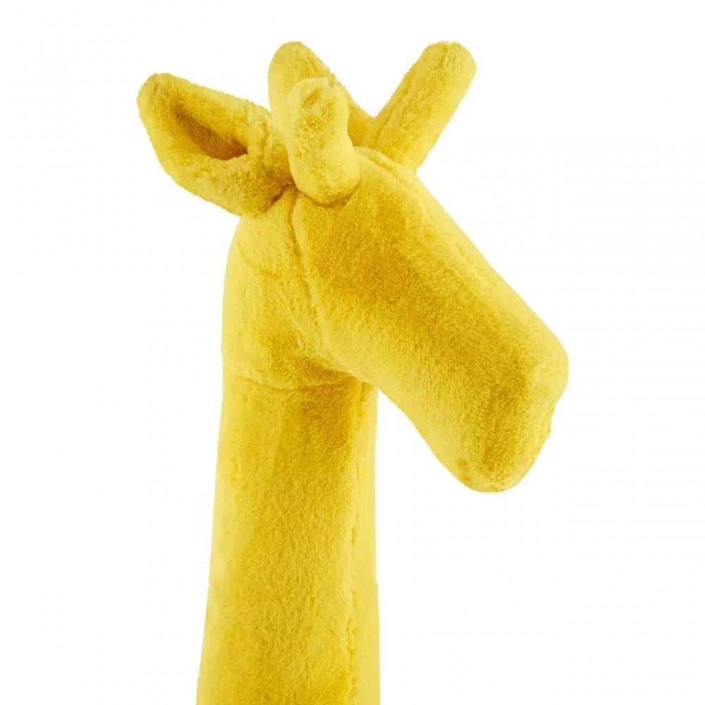 Yellow plush giraffe head wall decor with soft textured surface