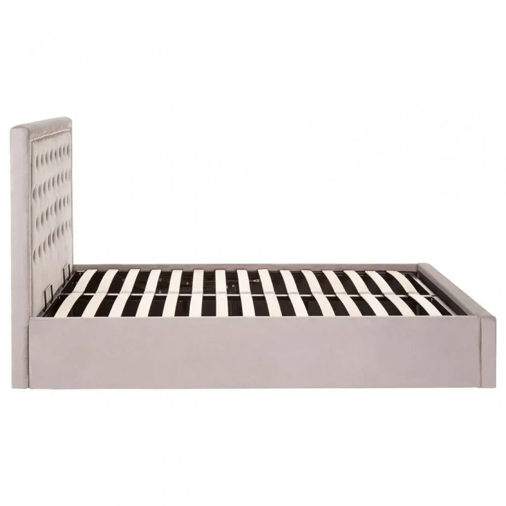 Grey upholstered bed frame with vertical slats and tufted headboard side view