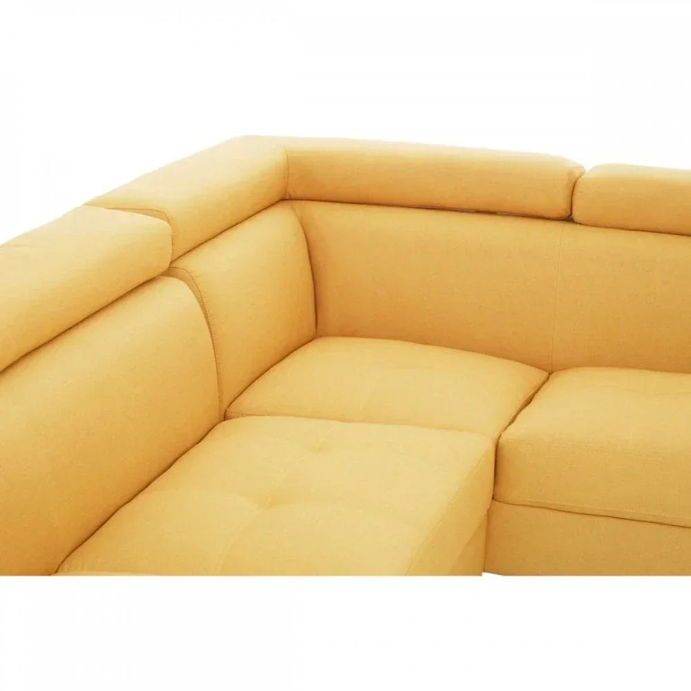Yellow fabric corner sofa with tufted seat and adjustable headrests, close-up view