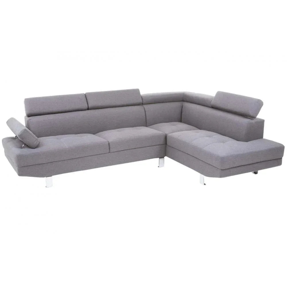 Modern grey corner sofa with adjustable headrests and chrome legs on a white background