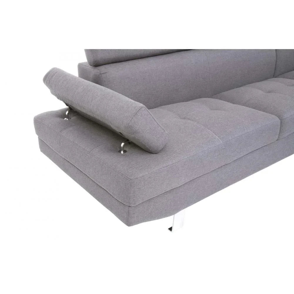 Grey fabric sofa with adjustable backrest and chrome legs, close-up of side section