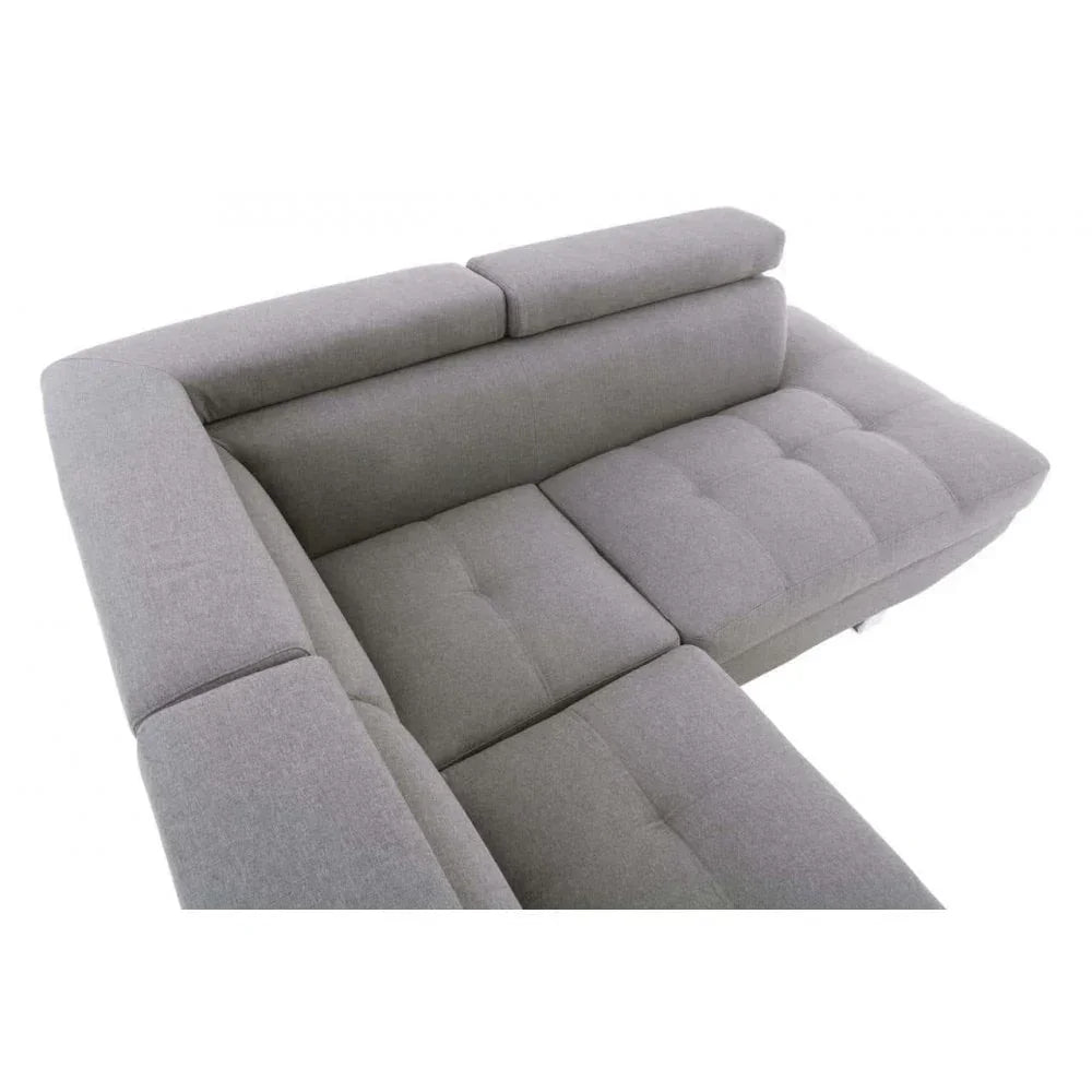 Grey fabric corner sofa with adjustable headrests and tufted seat detail, top view