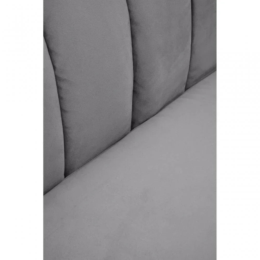 Close-up of grey fabric sofa seat and vertical stitched backrest upholstery