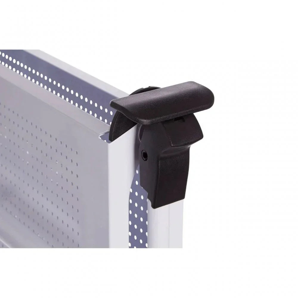 Close-up of metal bed safety rail with black plastic locking mechanism
