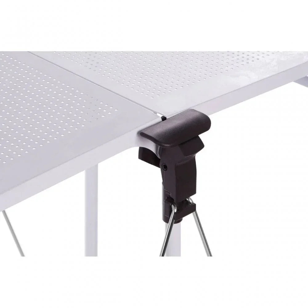 Closeup of folding table hinge with perforated white metal tabletop and locking mechanism