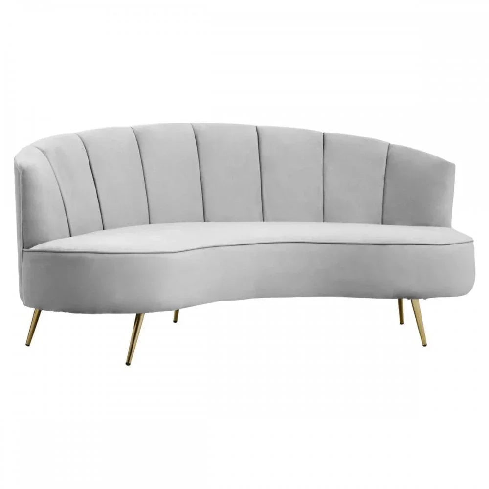 Curved grey velvet sofa with vertical channel back and gold legs