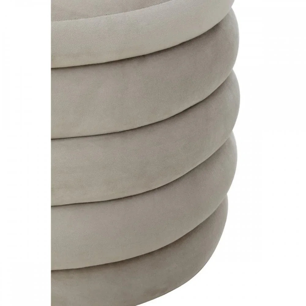 Close view of soft taupe velvet ottoman with ribbed upholstered detail