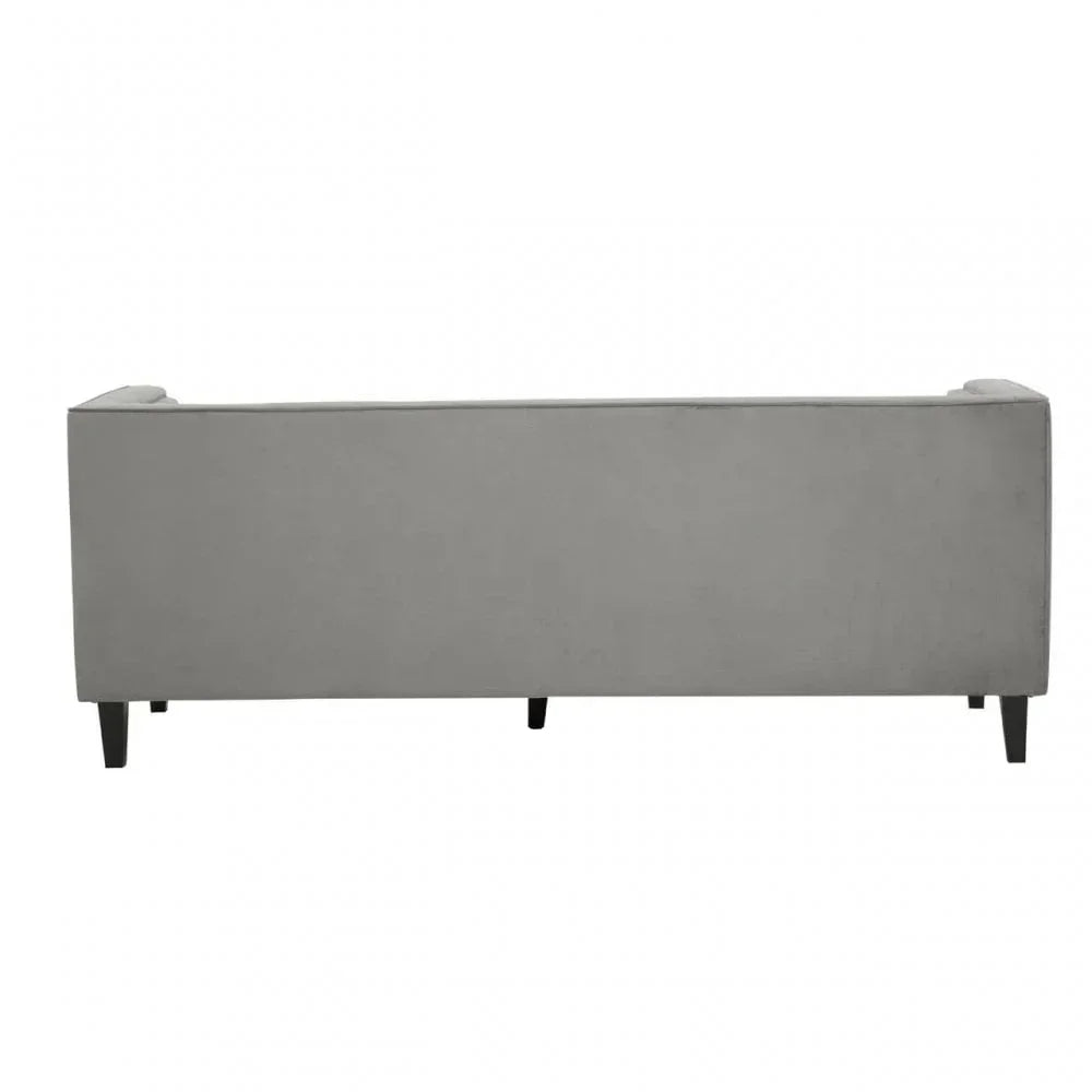 Back view of grey fabric sofa with straight lines and slim black legs