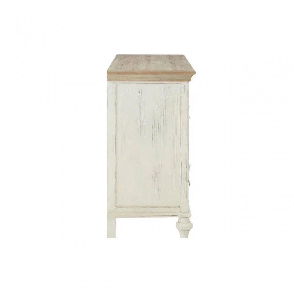 Side view of white wood chest of drawers with natural oak top and turned leg