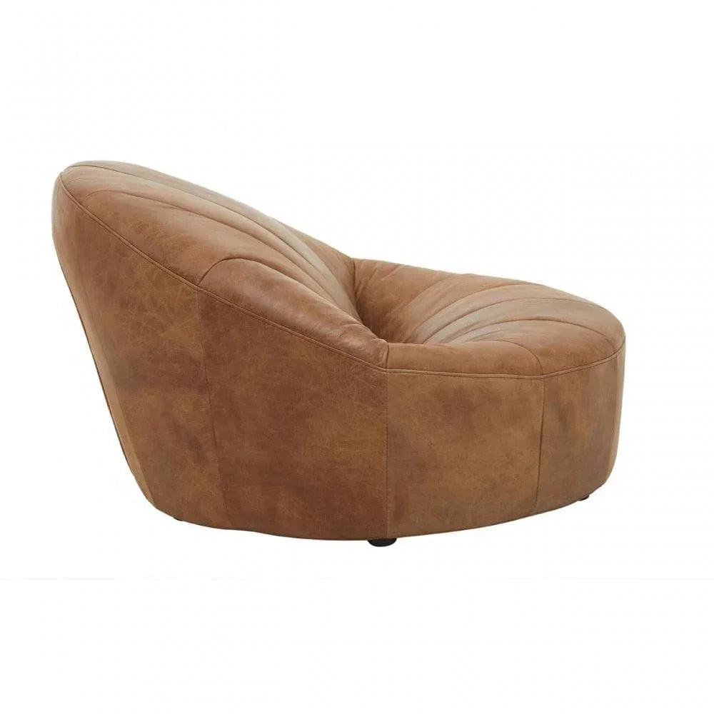 Tan leather accent chair with curved backrest and stitched detailing, side angle view