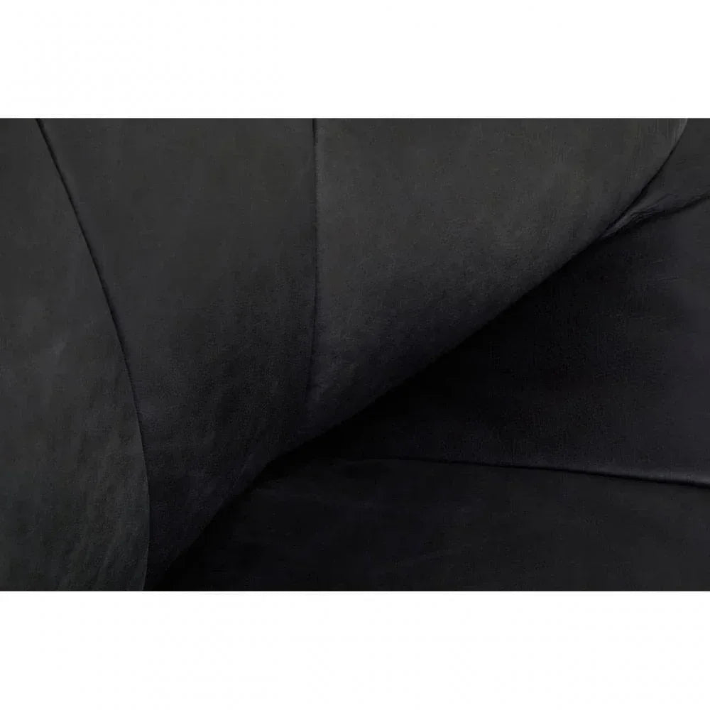 Close-up of black fabric sofa cushion with visible stitching detail