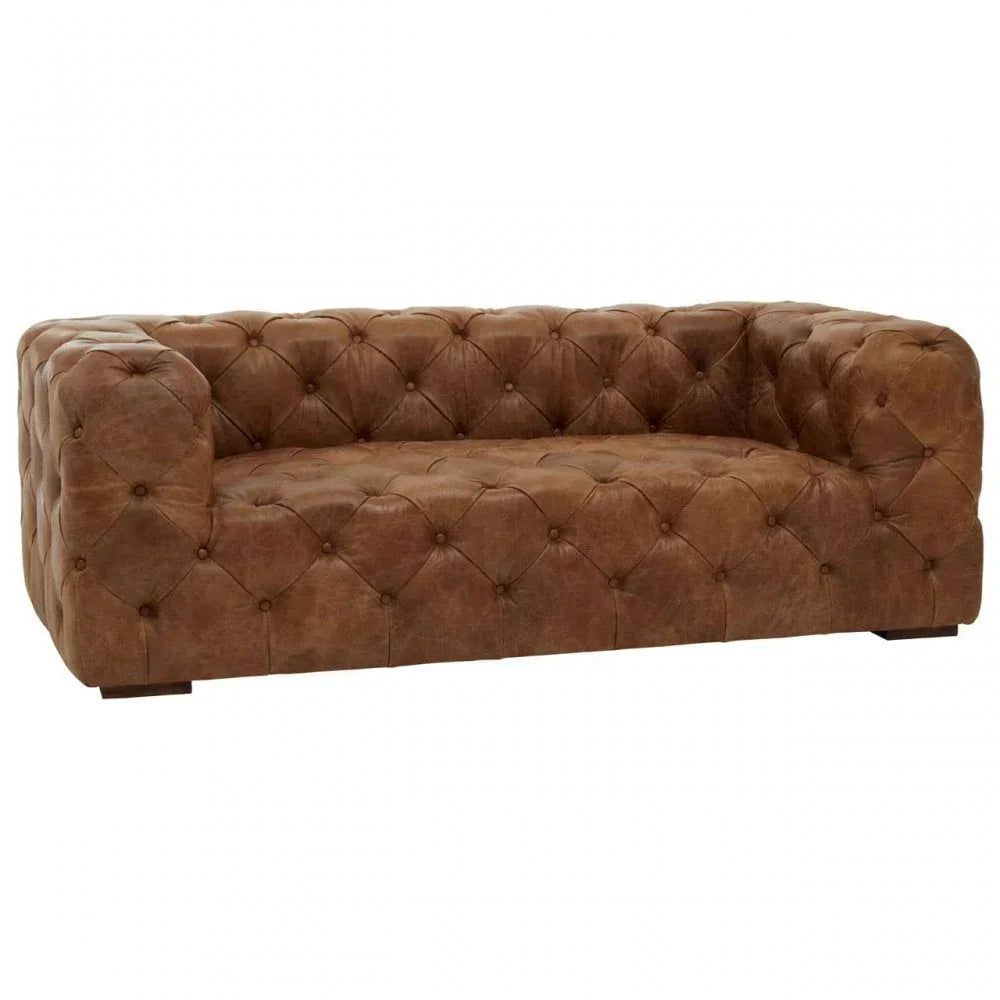 Brown leather sofa with deep button tufting and wide arms, front angle view
