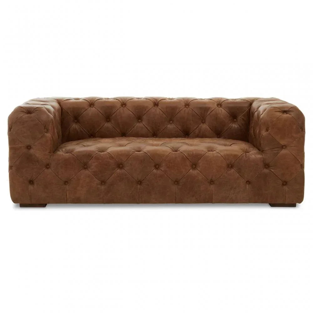 Brown leather Chesterfield sofa with deep button tufting and low block feet, front view