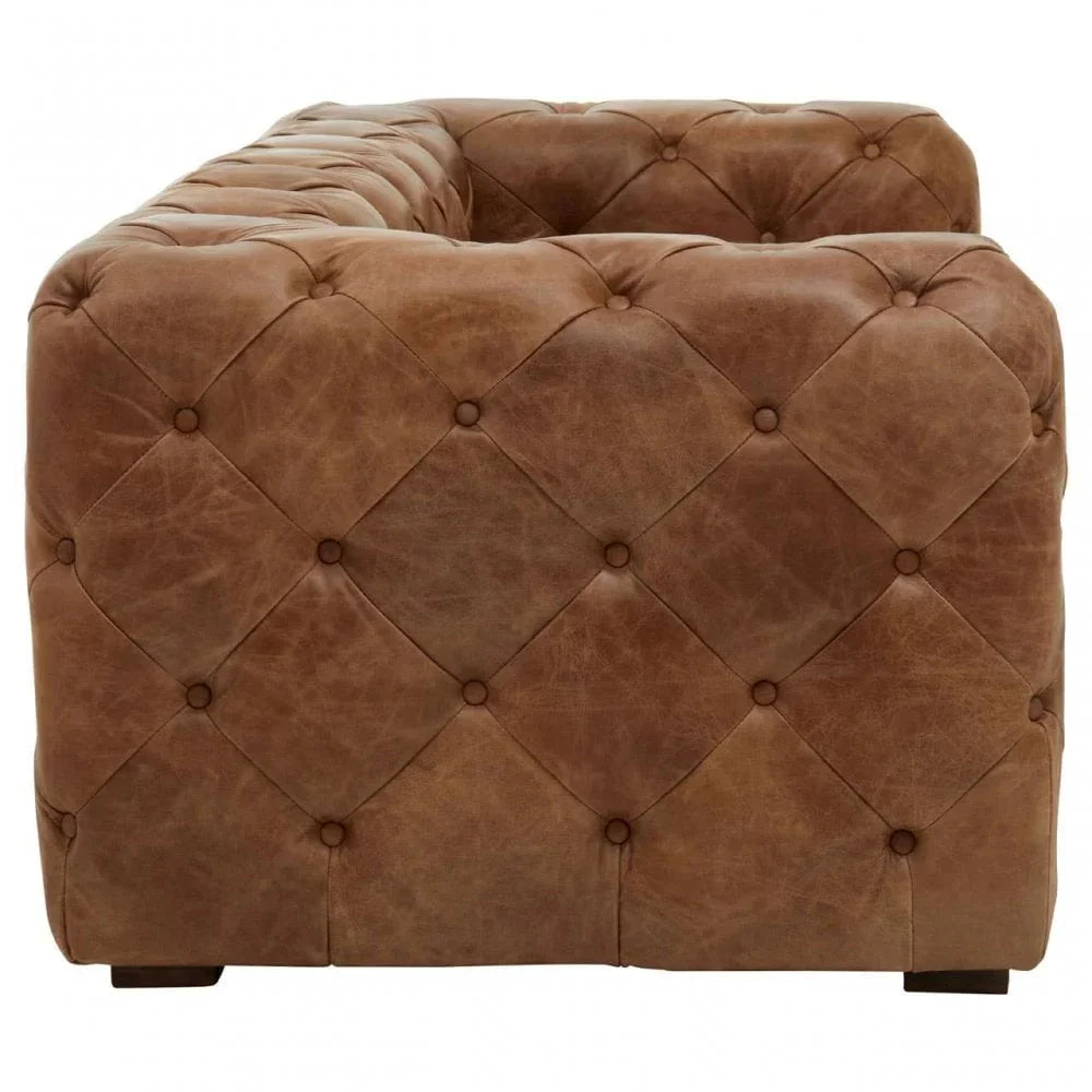 Tufted brown leather sofa with deep buttons, shown from the side angle