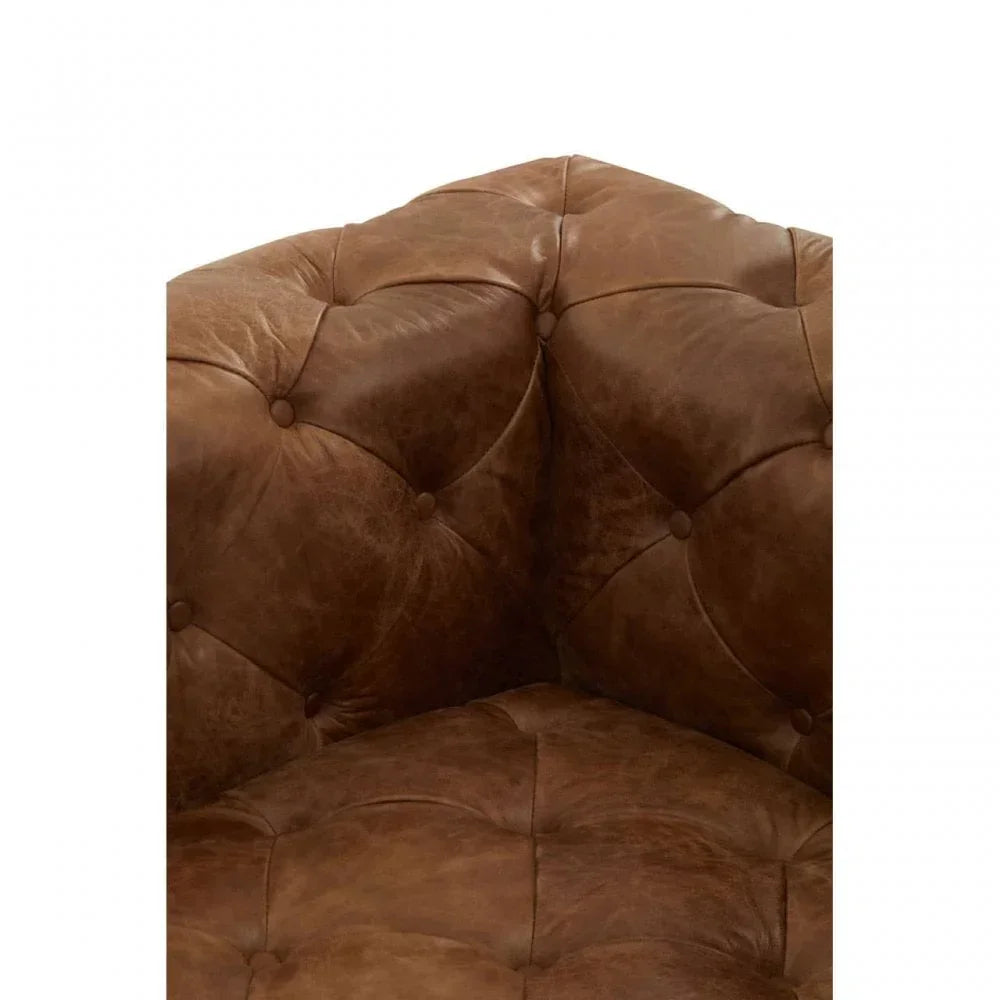 Tufted brown leather sofa corner with button detailing and smooth finish