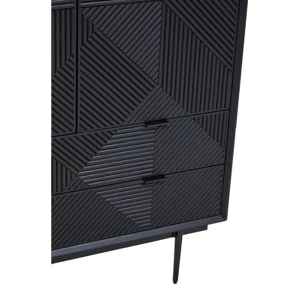 Black wooden chest of drawers with geometric textured front and slim legs
