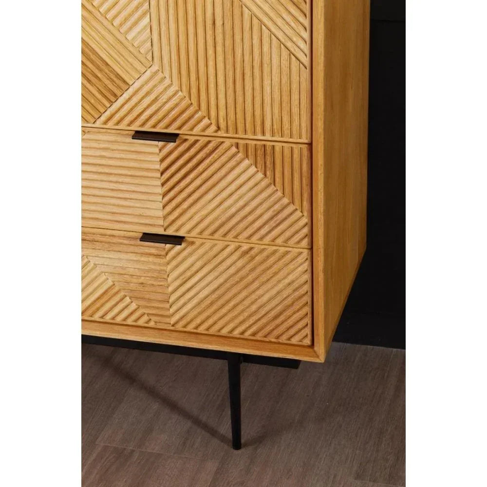 Wooden chest of drawers with geometric carved fronts and black metal legs