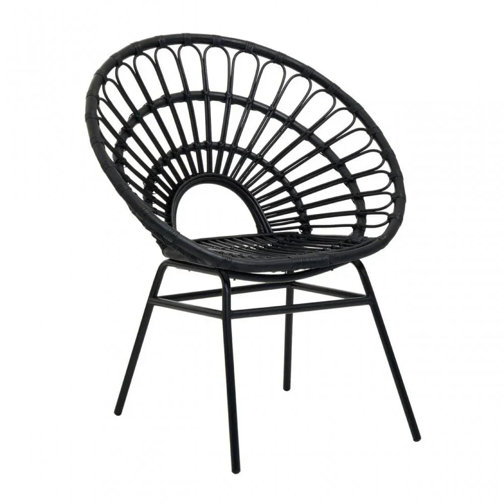 Black rattan accent chair with round backrest and open weave design on metal legs