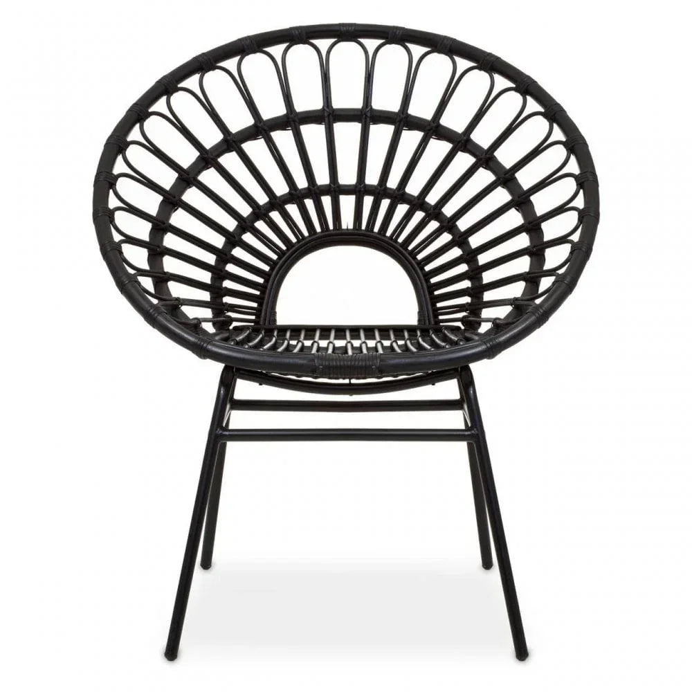 Black rattan accent chair with round open weave back and metal legs, front view