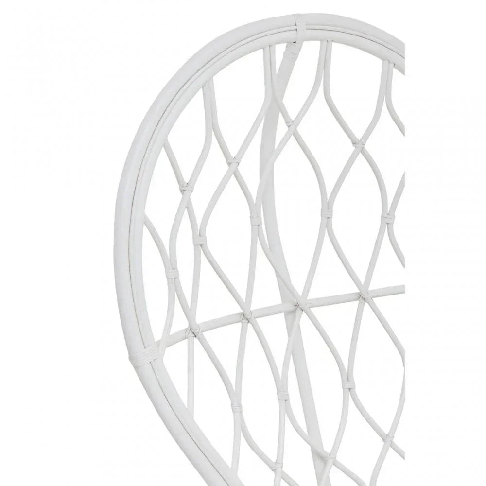 White rattan chair backrest with curved frame and woven lattice pattern, closeup view