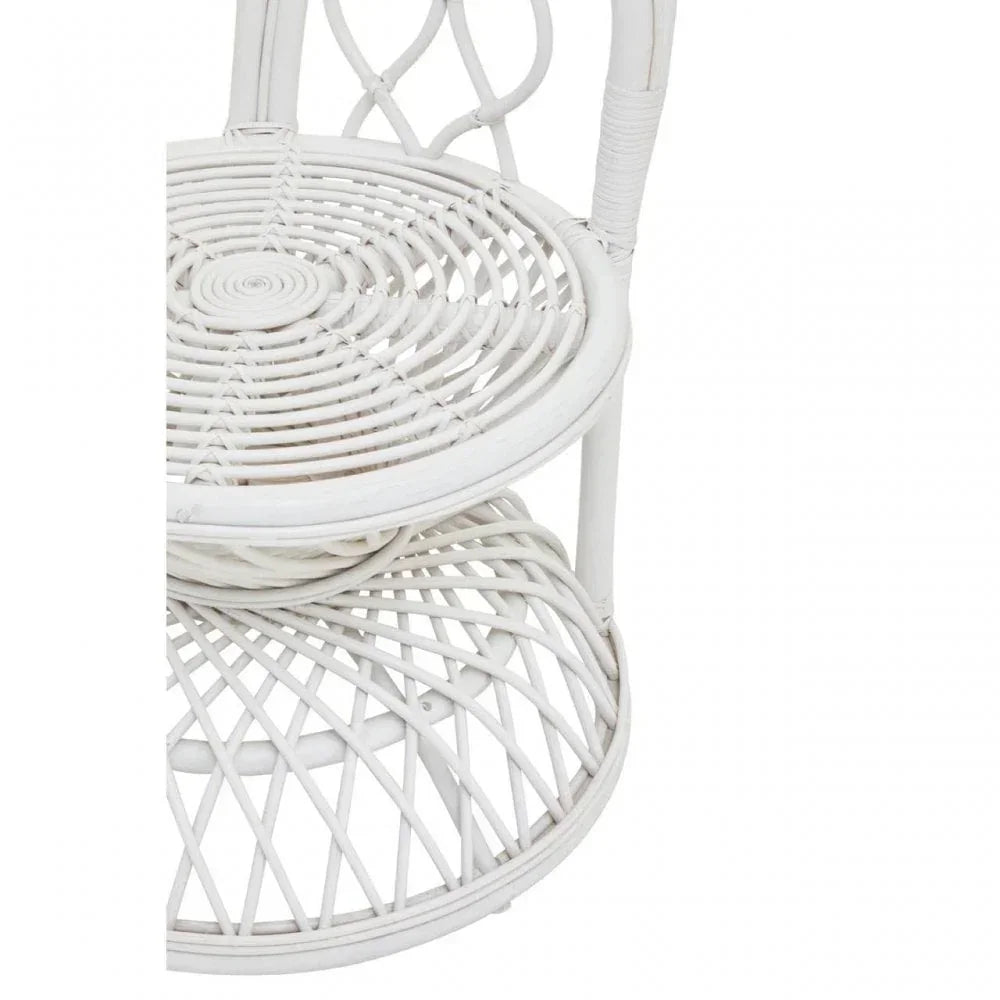 White rattan side table with round double-tier woven shelves and curved frame detail