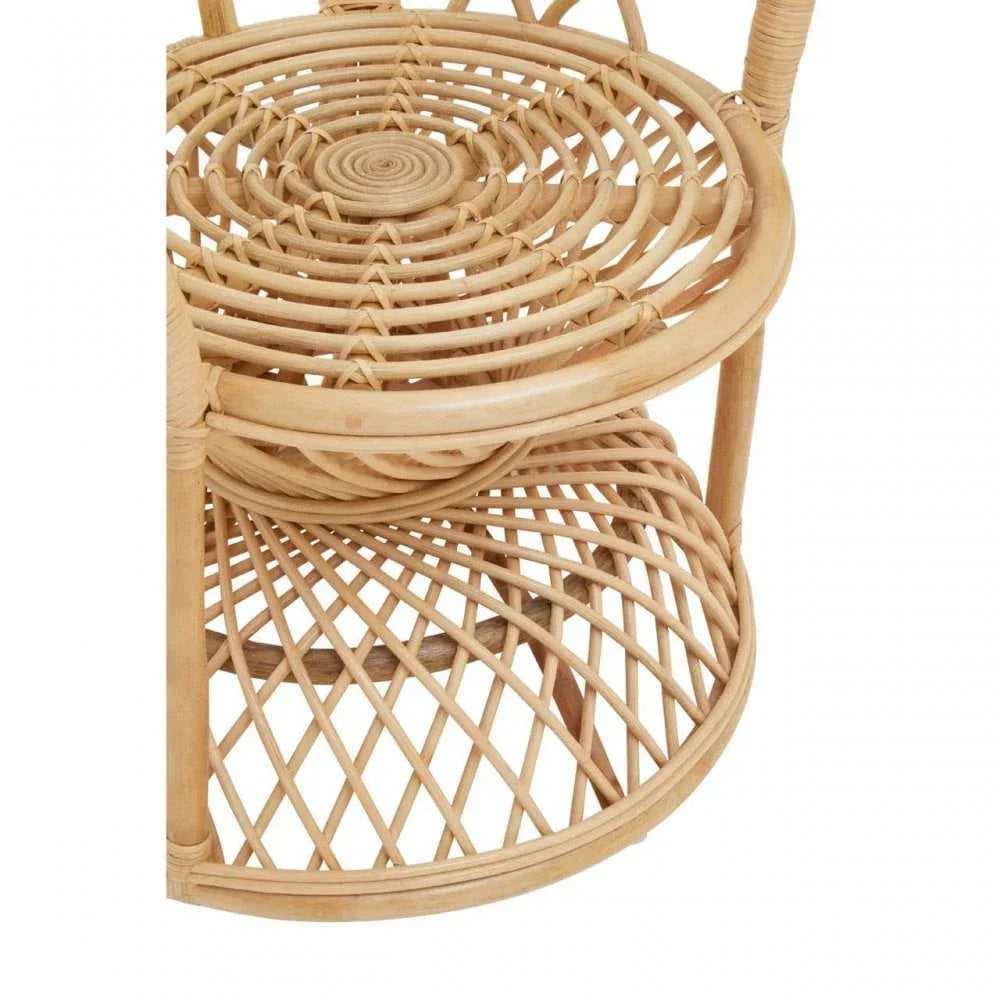Two-tier rattan side table with circular woven shelves and natural finish, close view