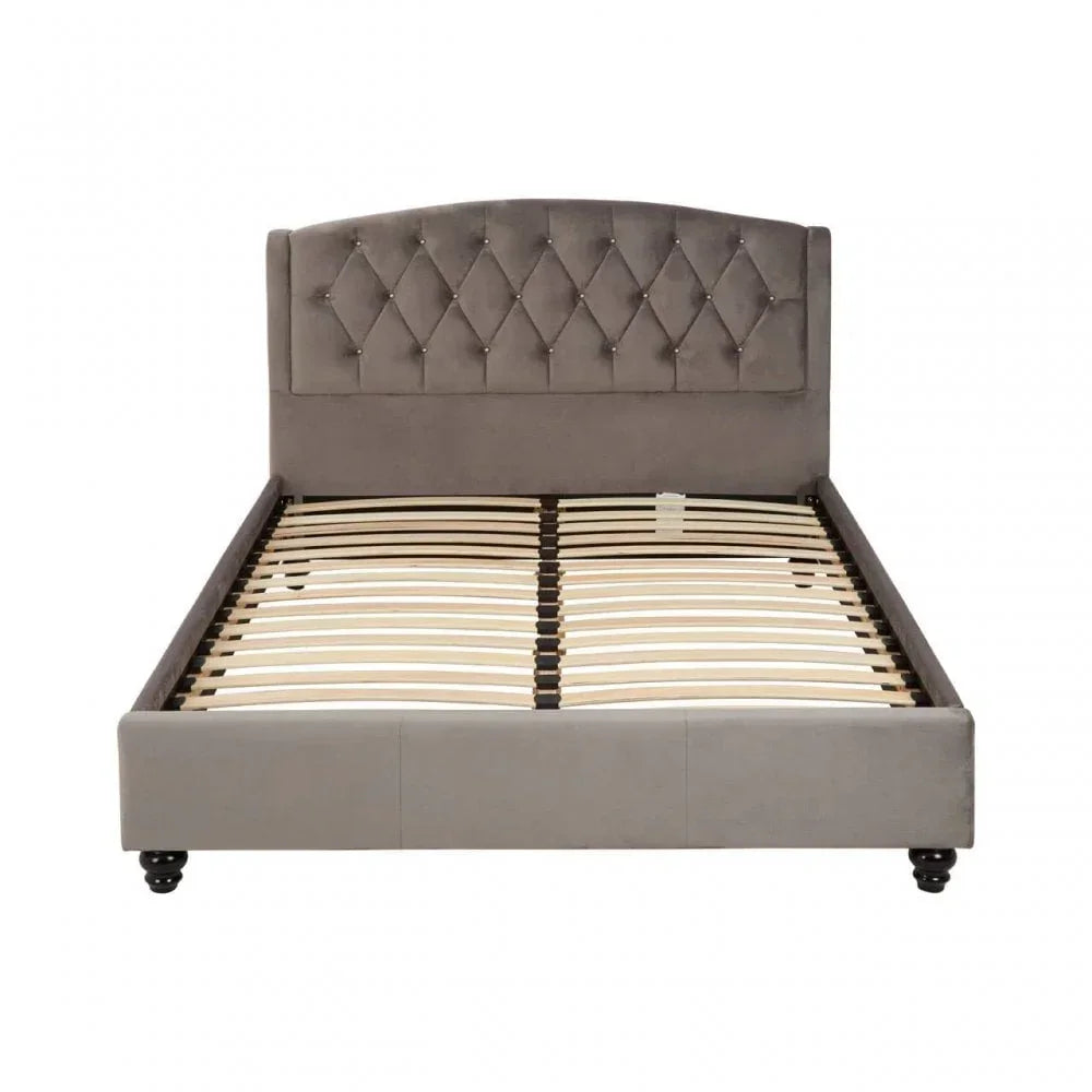 Grey upholstered bed frame with tufted headboard and wooden slats, front view