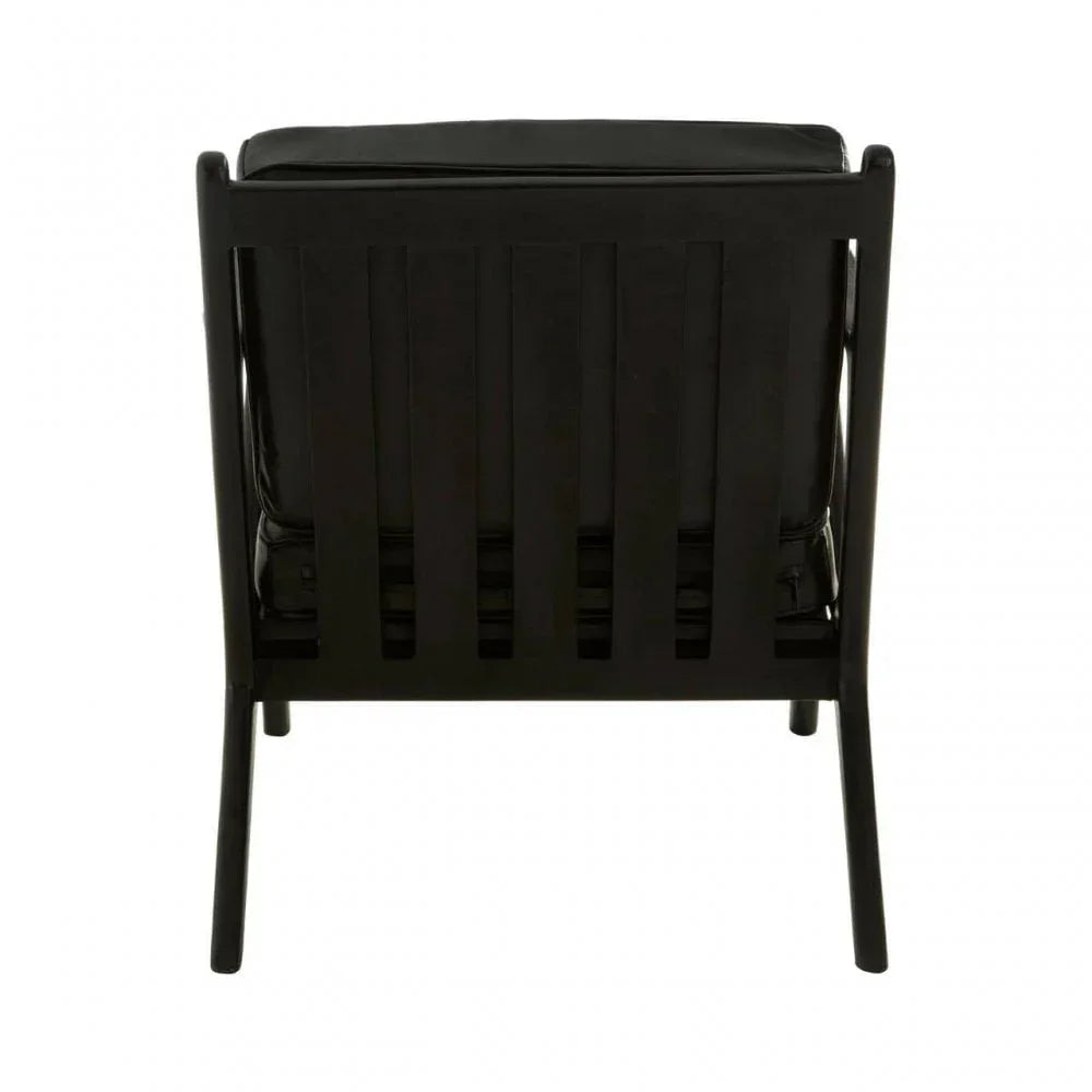 Back view of black wooden armchair with slatted design and padded seat cushion
