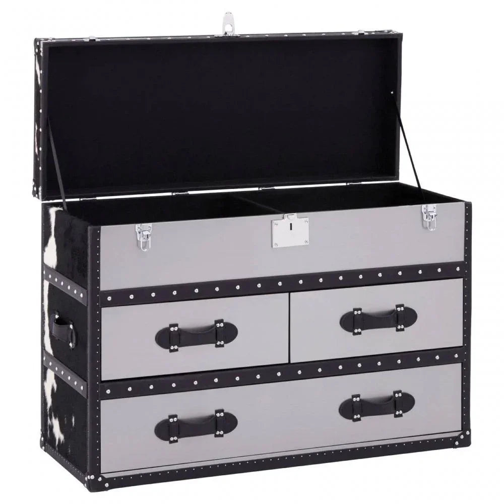 Grey storage trunk with black studded trim, four drawers, and open hinged lid