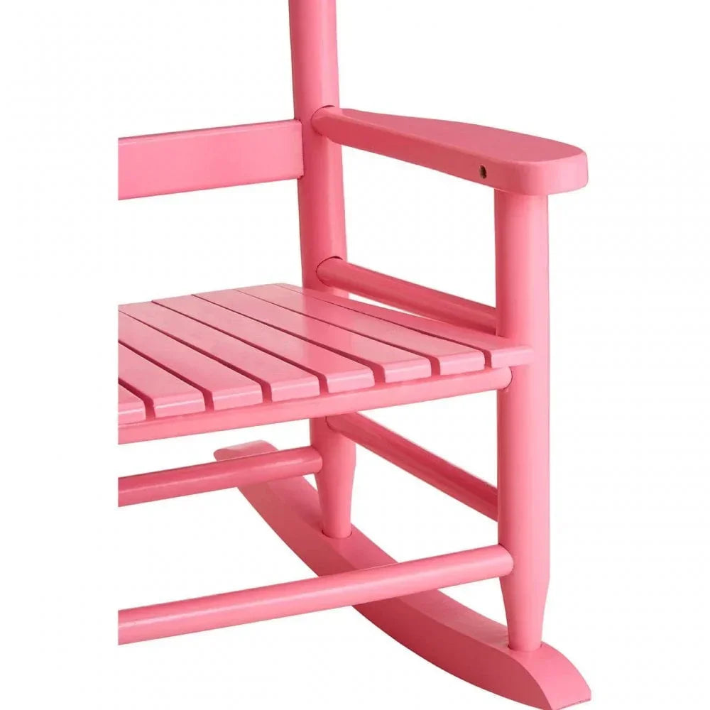 Close up of pink wooden rocking chair armrest and seat slats