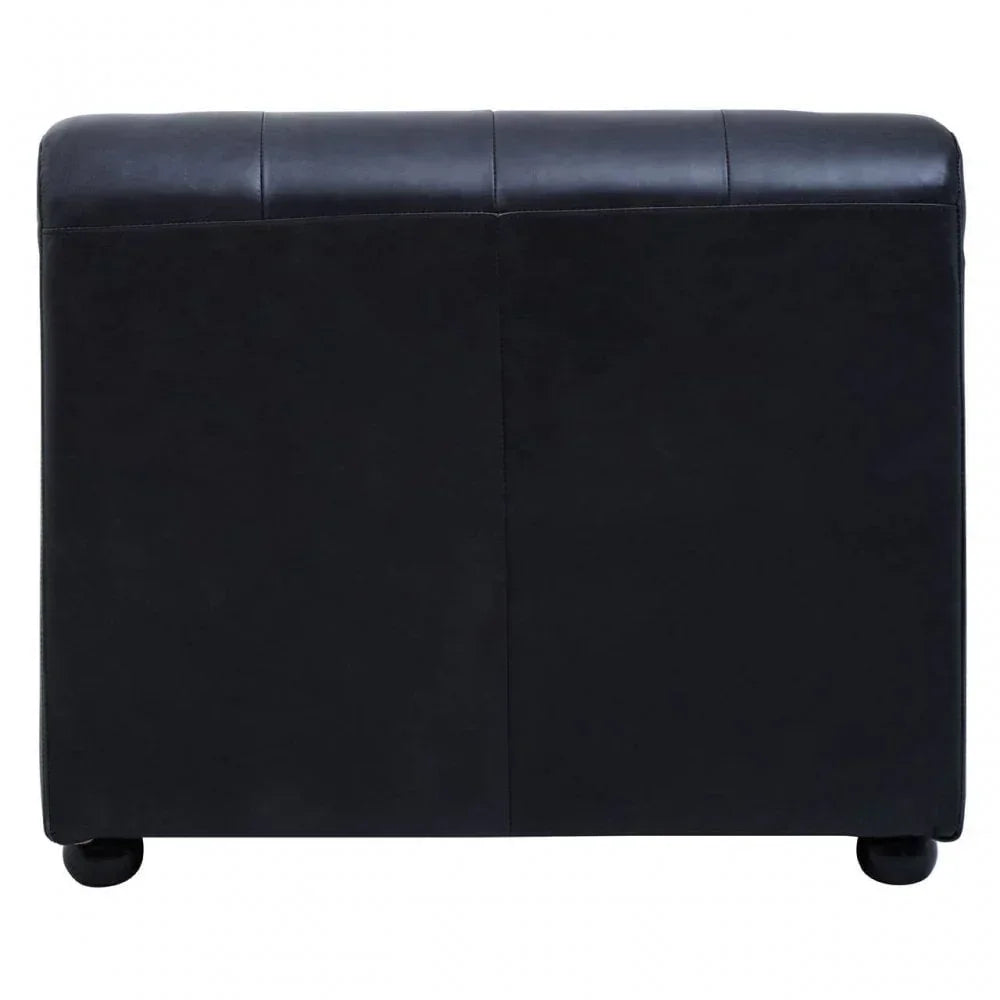 Rear view of black leather upholstered bed headboard with stitched detail and low feet