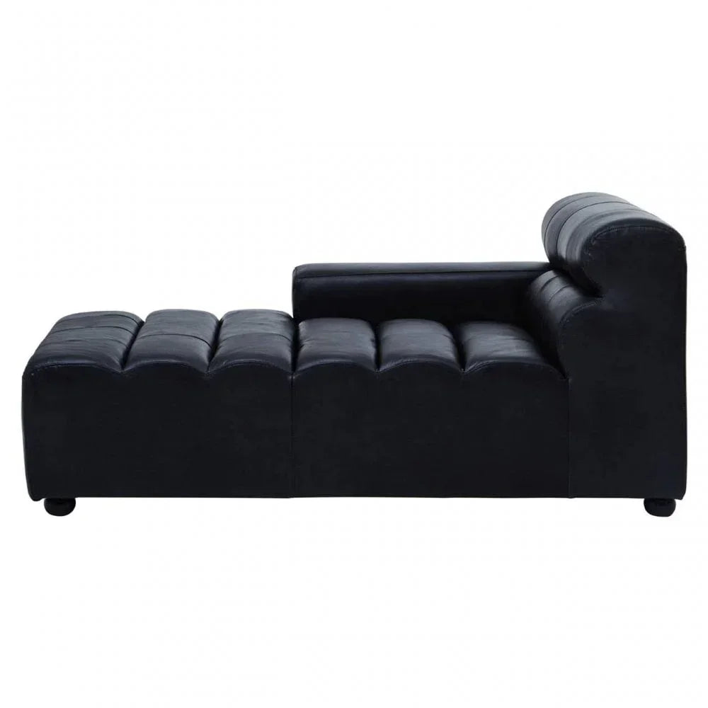 Black leather chaise lounge sofa with tufted seat and right armrest, side profile view
