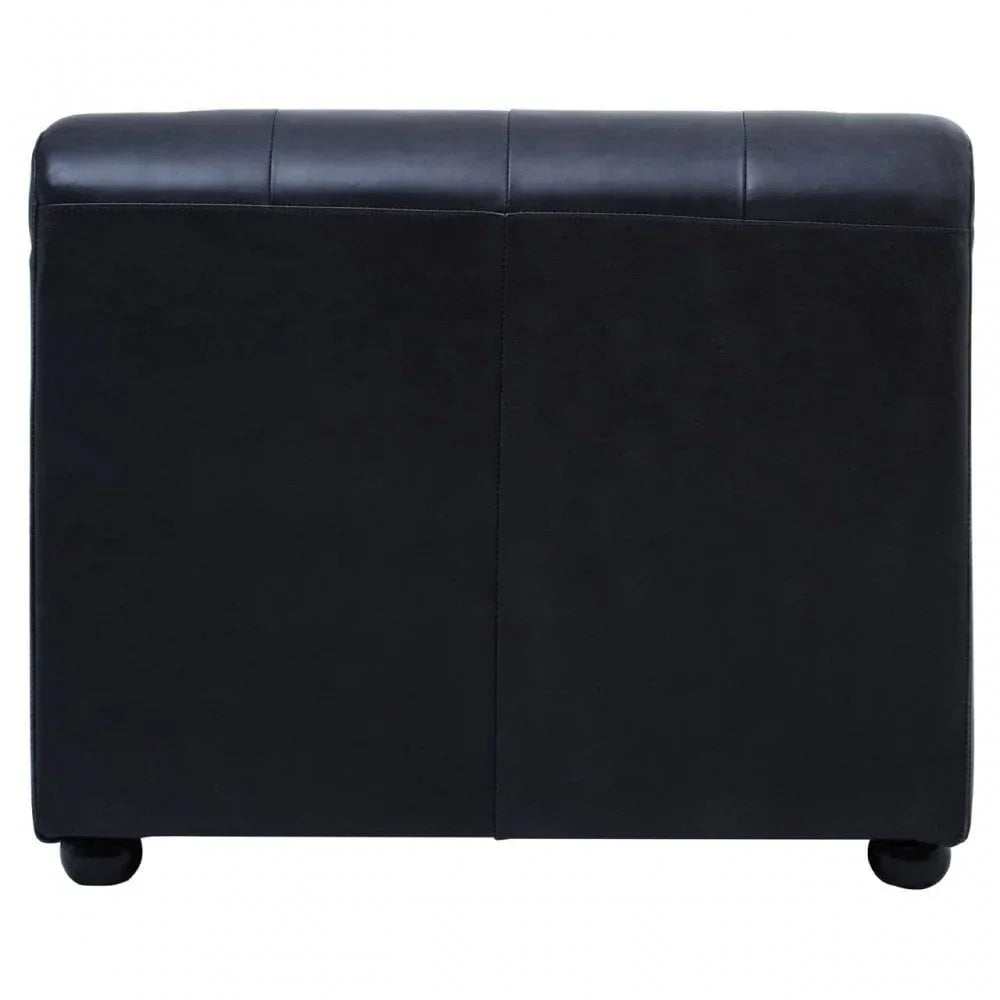 Black upholstered ottoman storage bench with stitched detail and short legs, rear angle view