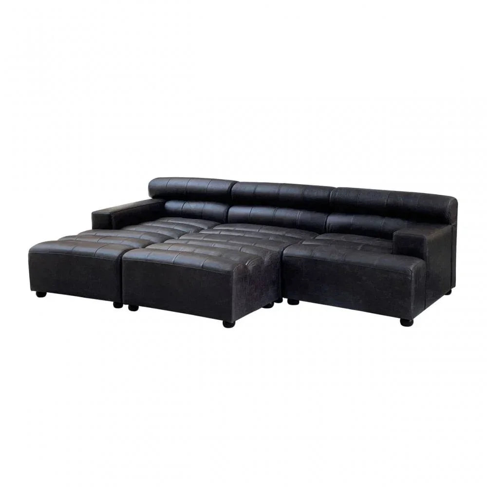 Black leather corner sofa with tufted cushions and low arms, shown from front angle