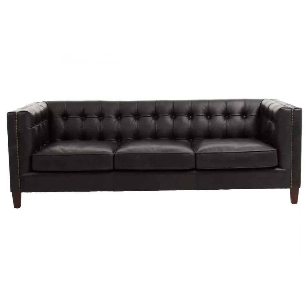 Black leather sofa with button-tufted backrest and square arms on wooden legs