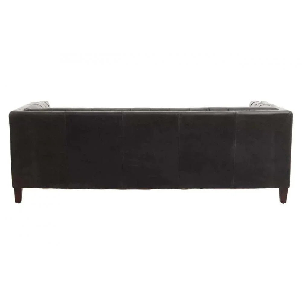 Back view of a black leather sofa with wooden legs, showing smooth upholstery