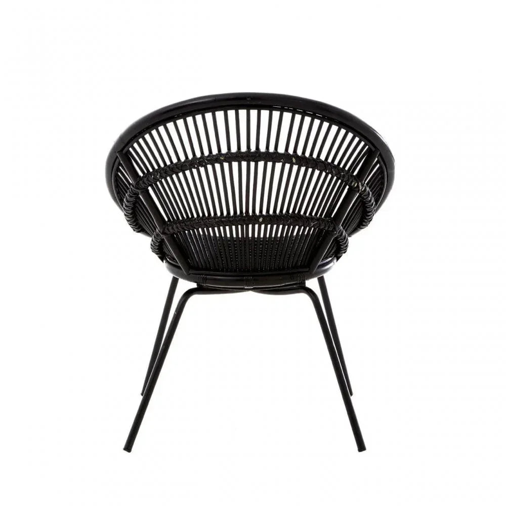 Black rattan accent chair with curved back and metal legs, rear view