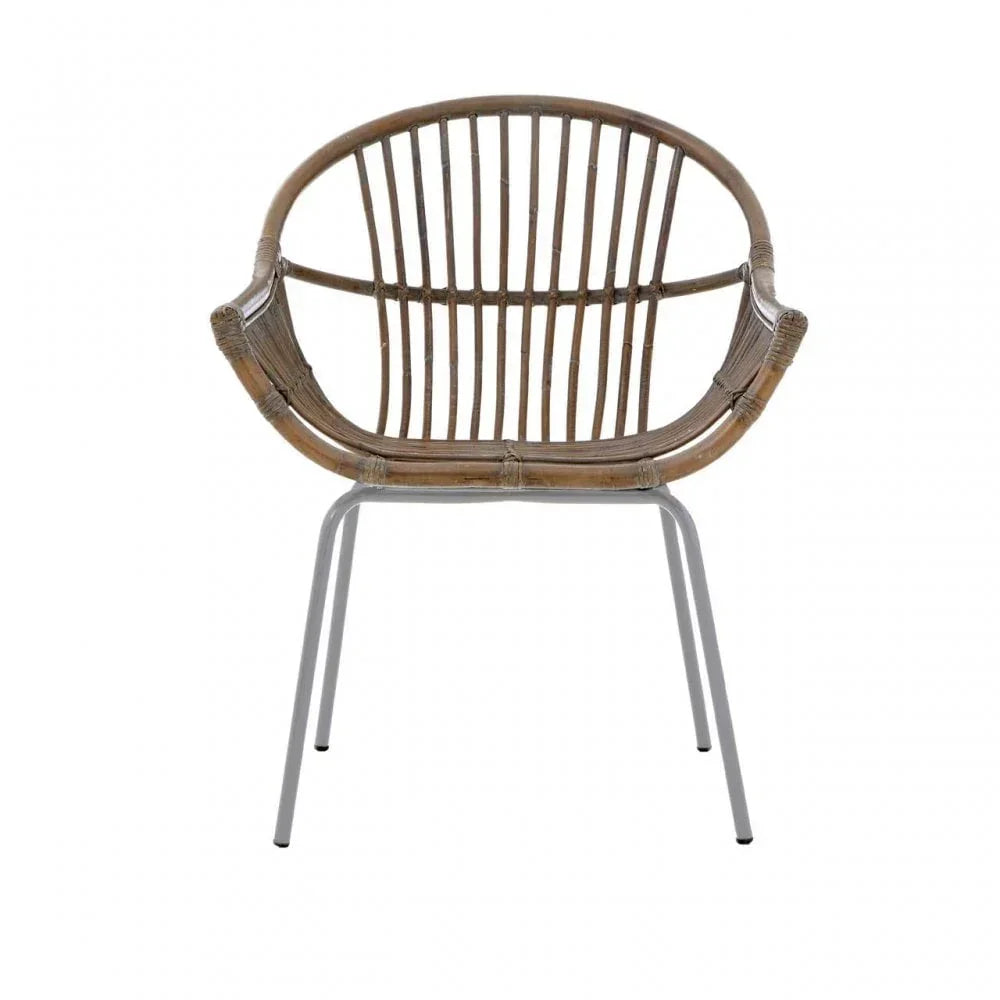 Rattan dining chair with curved backrest and slim metal legs, front view