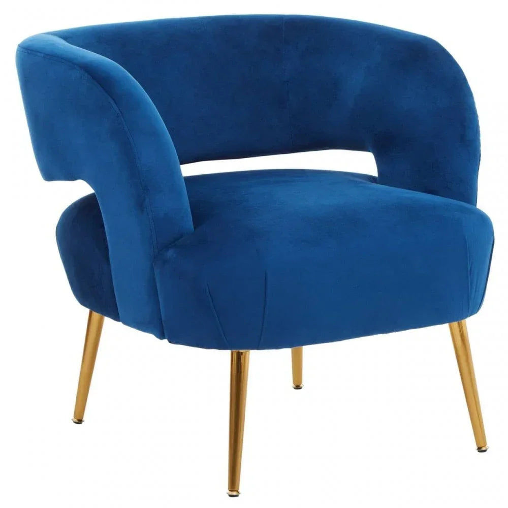 Blue velvet accent chair with curved backrest and gold metal legs