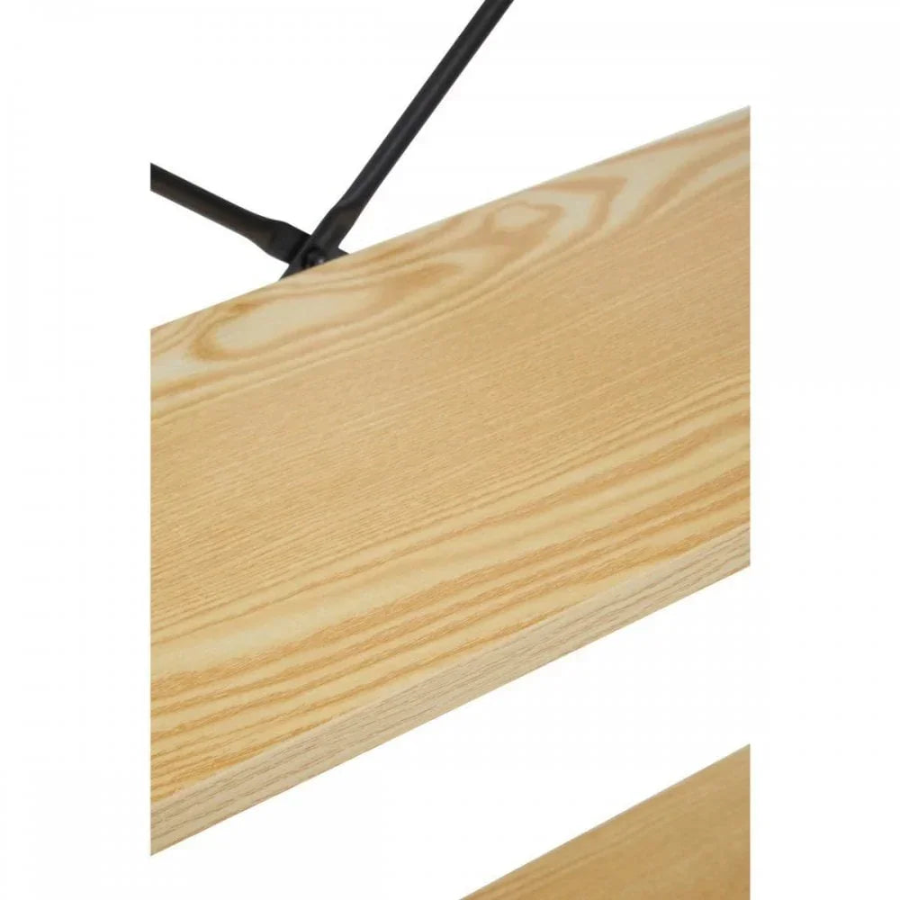 closeup of light wood grain shelf with black metal support bracket