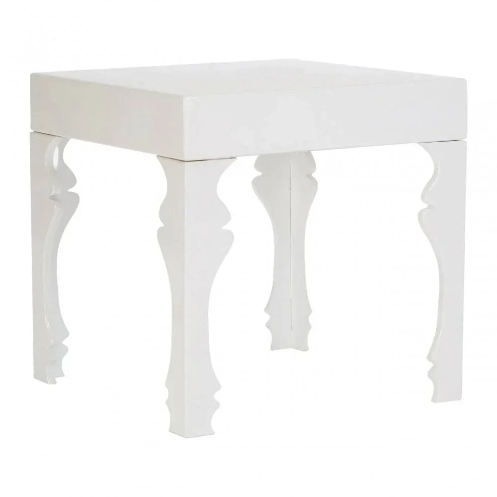 White wooden side table with decorative curved legs on a plain background