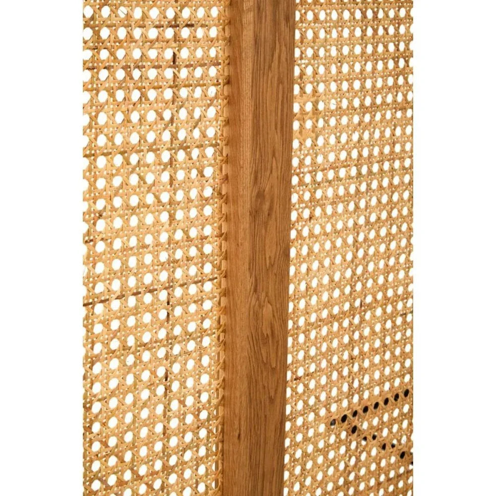 Natural rattan room divider with woven cane panels and wooden frame, close-up view