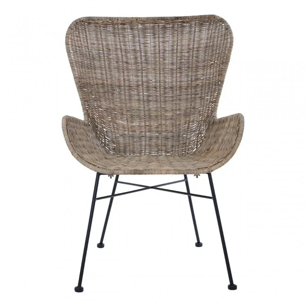 Woven rattan accent chair with curved backrest and black metal legs, rear angle view