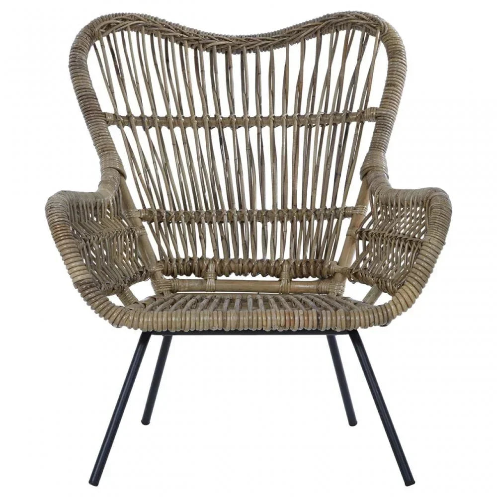 Natural rattan armchair with curved backrest and black metal legs, front view