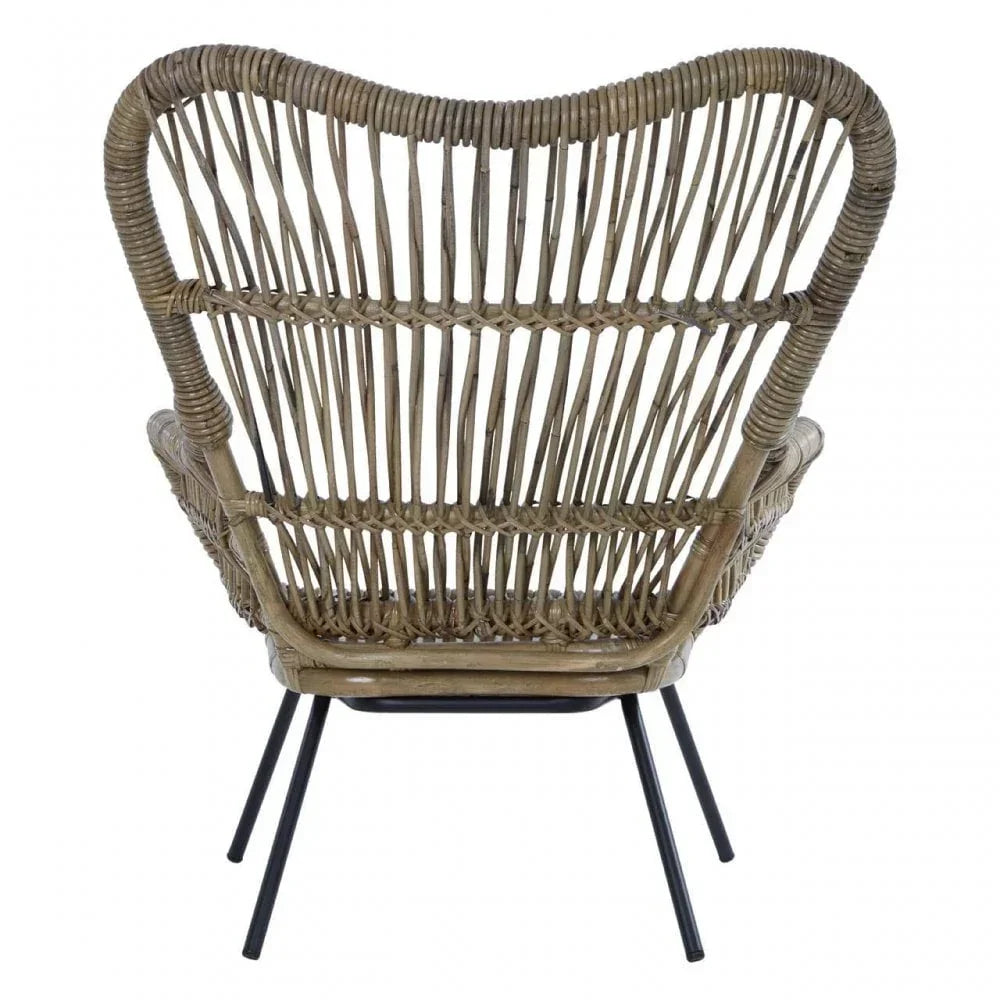 Back view of rattan accent chair with black metal legs and woven natural finish
