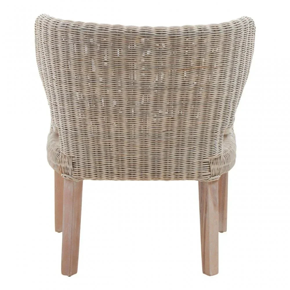 Back view of wicker dining chair with curved seat and light wooden legs